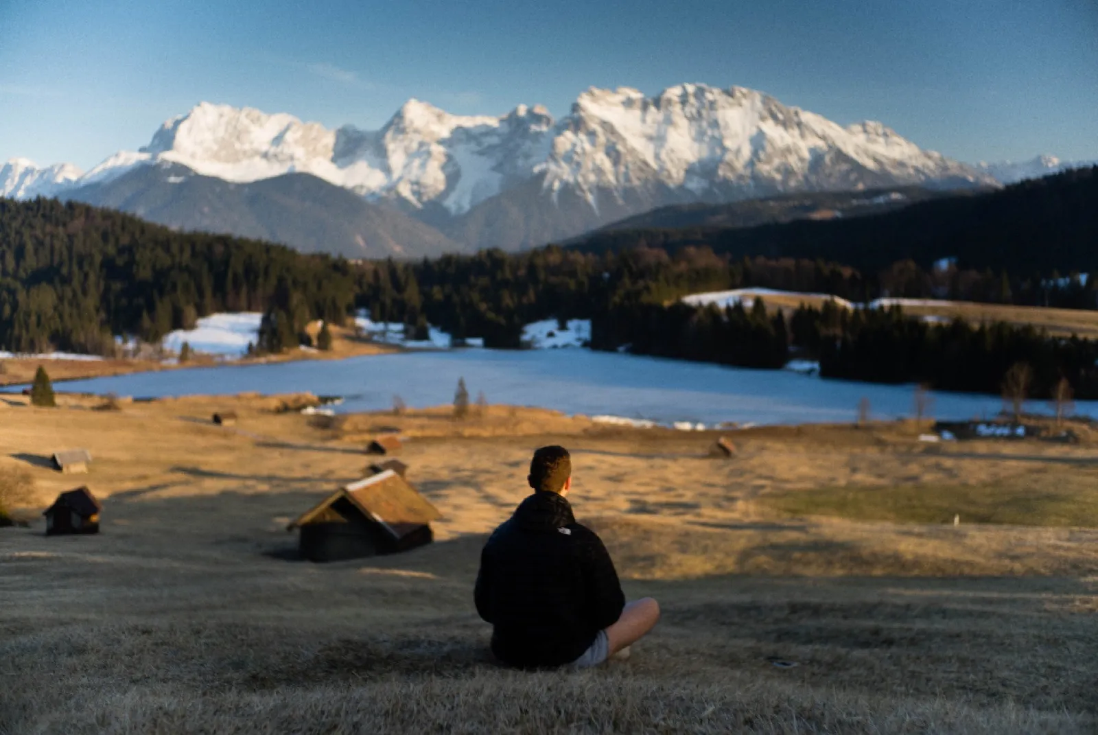 Snow-covered peaks under cloud